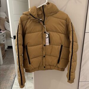 Tan Puffer Jacket with Black Accents